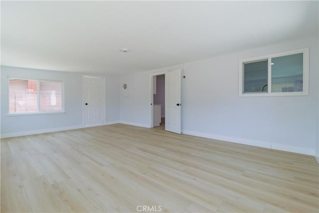 25411 Cottage Ave, Loma Linda, CA 92354 - spare room featuring light wood finished floors and baseboards
