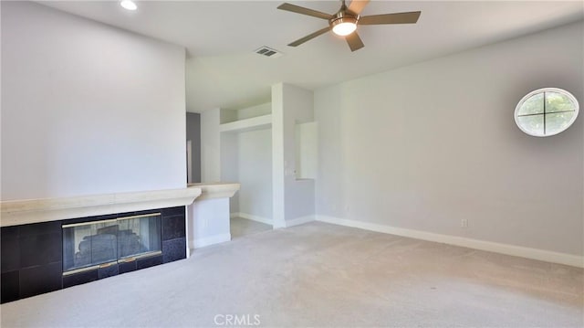 2431 Elizabeth Ct, Upland, CA 91784 - unfurnished living room with light colored carpet, a ceiling fan, recessed lighting, and a fireplace
