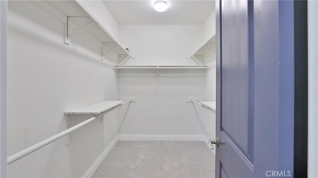 2431 Elizabeth Ct, Upland, CA 91784 - spacious closet featuring light carpet