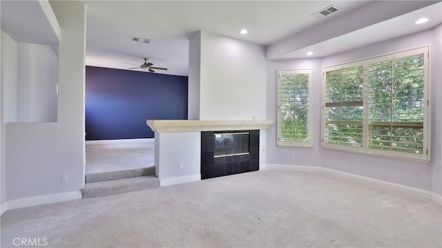 2431 Elizabeth Ct, Upland, CA 91784 - unfurnished living room with carpet floors, a fireplace, a ceiling fan, and recessed lighting