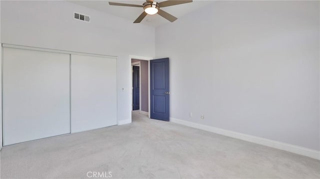 2431 Elizabeth Ct, Upland, CA 91784 - unfurnished bedroom with carpet floors, a closet, high vaulted ceiling, and ceiling fan