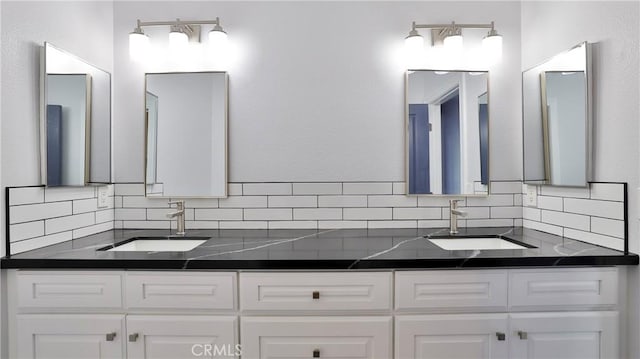 2431 Elizabeth Ct, Upland, CA 91784 - bathroom with backsplash and double vanity