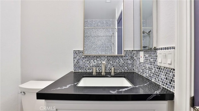 2431 Elizabeth Ct, Upland, CA 91784 - bathroom featuring vanity and backsplash