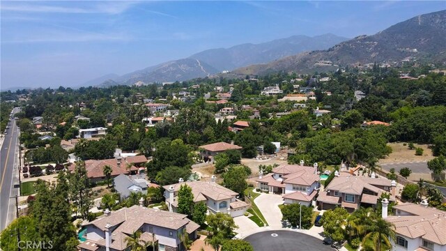 2431 Elizabeth Ct, Upland, CA 91784 - aerial perspective of suburban area with a mountainous background