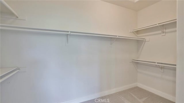 2431 Elizabeth Ct, Upland, CA 91784 - spacious closet featuring light carpet