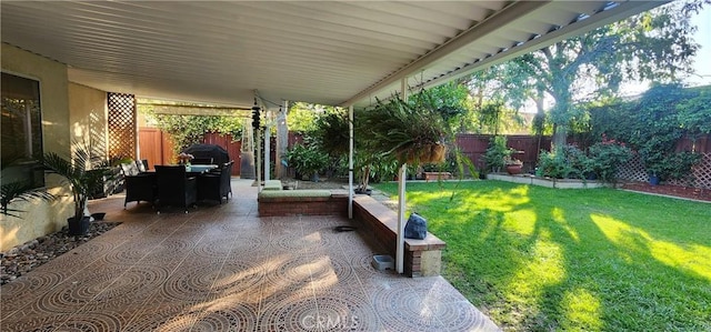 1447 Genoa Ln, San Jacinto, CA 92583 - fenced backyard featuring a patio area and outdoor dining space