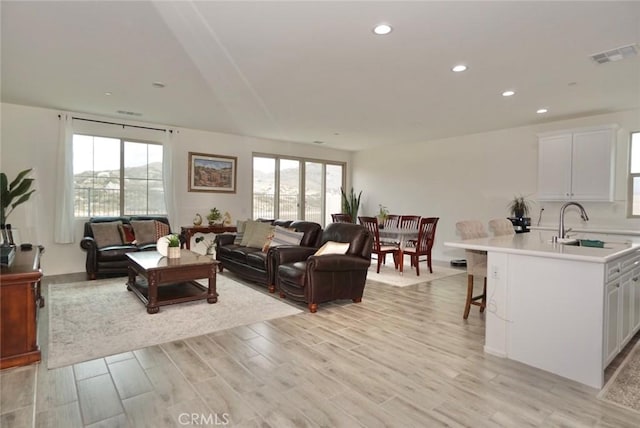 3042 Eveningcloud St, Hemet, CA 92543 - living room featuring light wood-type flooring and recessed lighting
