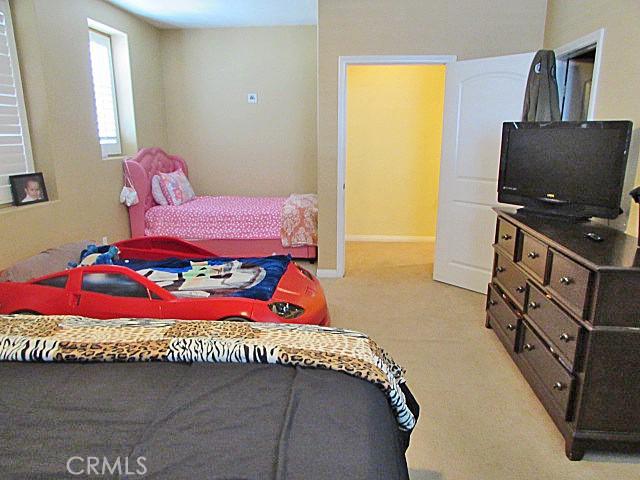 3981 E Emory Ln Unit 6, Ontario, CA 91761 - bedroom featuring carpet and baseboards