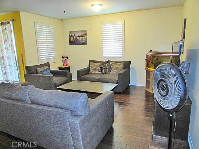 3981 E Emory Ln Unit 6, Ontario, CA 91761 - living area with dark wood-type flooring
