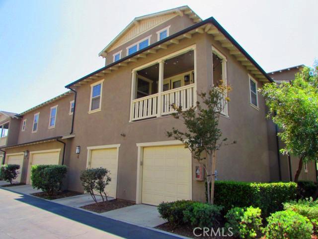 3981 E Emory Ln Unit 6, Ontario, CA 91761 - view of front facade with an attached garage and stucco siding