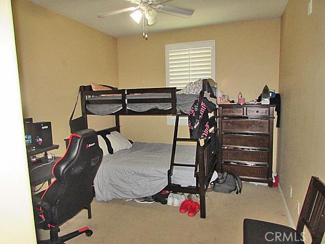 3981 E Emory Ln Unit 6, Ontario, CA 91761 - carpeted bedroom with ceiling fan