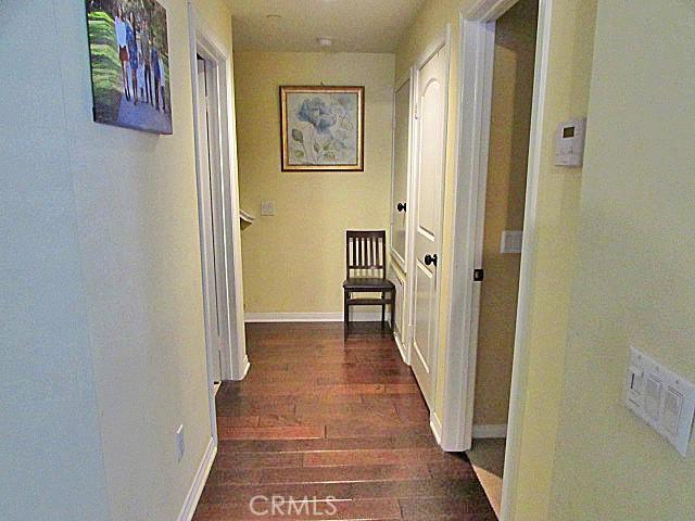 3981 E Emory Ln Unit 6, Ontario, CA 91761 - hall with wood finished floors and baseboards