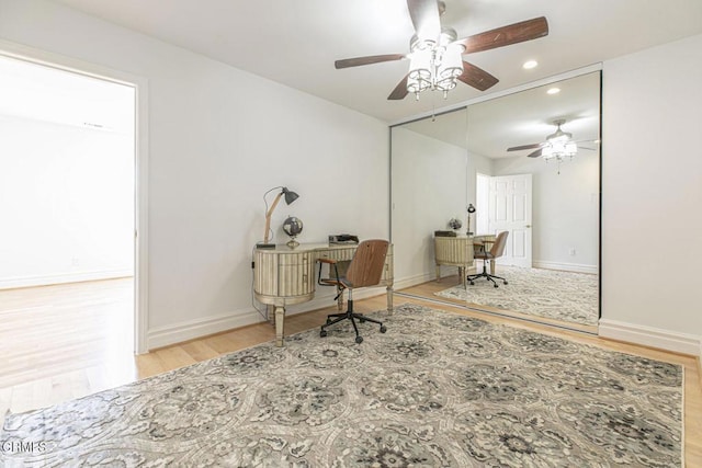 8857 Bluffdale Dr, Sun Valley, CA 91352 - home office featuring wood finished floors, a ceiling fan, recessed lighting, and baseboards
