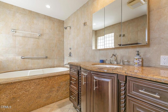 8857 Bluffdale Dr, Sun Valley, CA 91352 - full bathroom with tile walls, vanity, shower / tub combination, and tile patterned floors