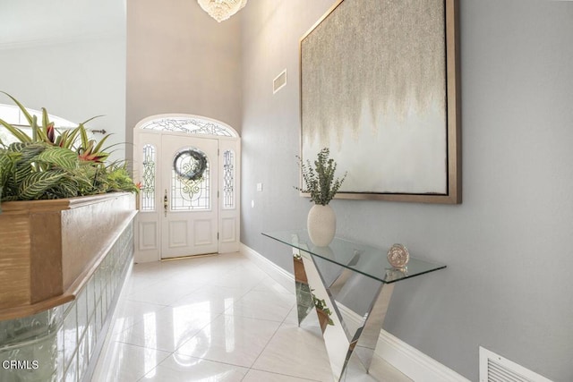 8857 Bluffdale Dr, Sun Valley, CA 91352 - entryway featuring light tile patterned floors and a towering ceiling