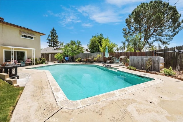 5644 Wadsworth Ave, Highland, CA 92346 - view of pool with a patio area and a fenced backyard