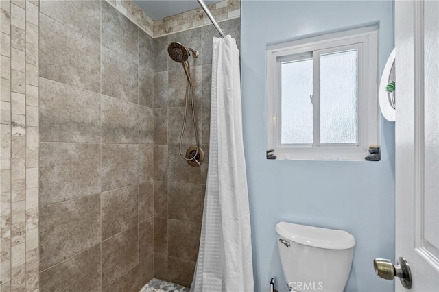 5644 Wadsworth Ave, Highland, CA 92346 - full bathroom with a tile shower and toilet