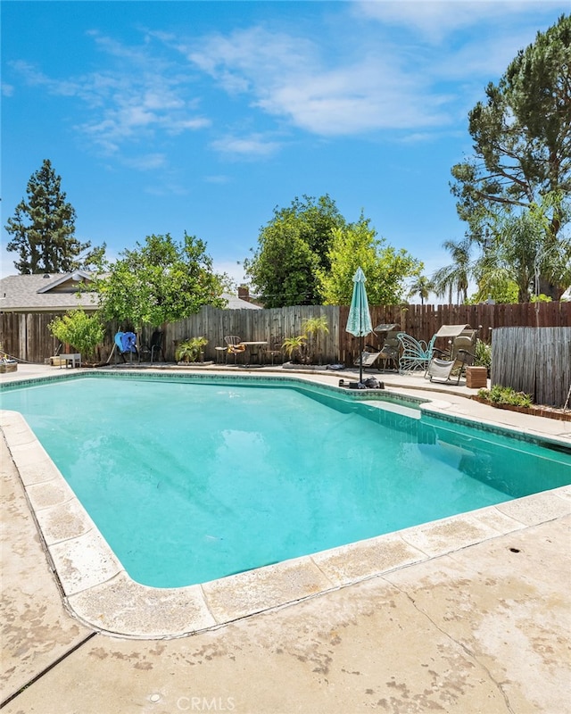 5644 Wadsworth Ave, Highland, CA 92346 - view of pool featuring a patio and a fenced backyard