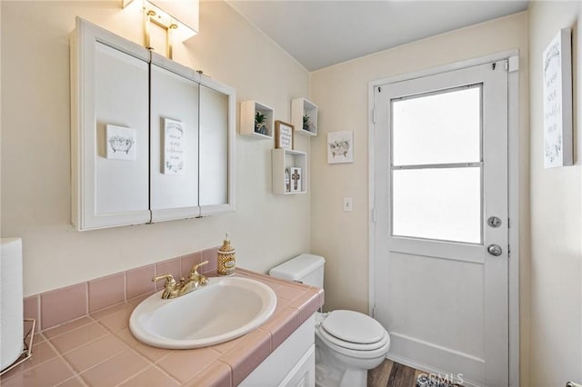 5644 Wadsworth Ave, Highland, CA 92346 - bathroom featuring vanity and toilet