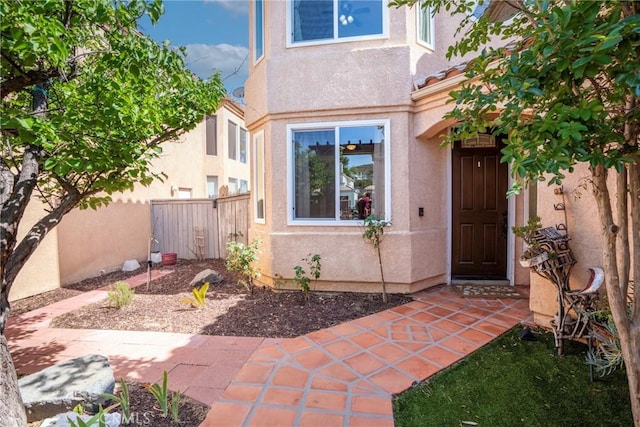 24101 Crowned Partridge Ln, Murrieta, CA 92562 - property entrance featuring stucco siding