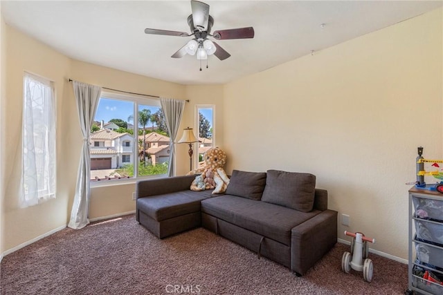 24101 Crowned Partridge Ln, Murrieta, CA 92562 - carpeted living room featuring ceiling fan and baseboards