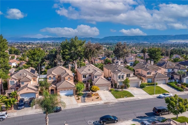 24101 Crowned Partridge Ln, Murrieta, CA 92562 - aerial perspective of suburban area with a mountainous background