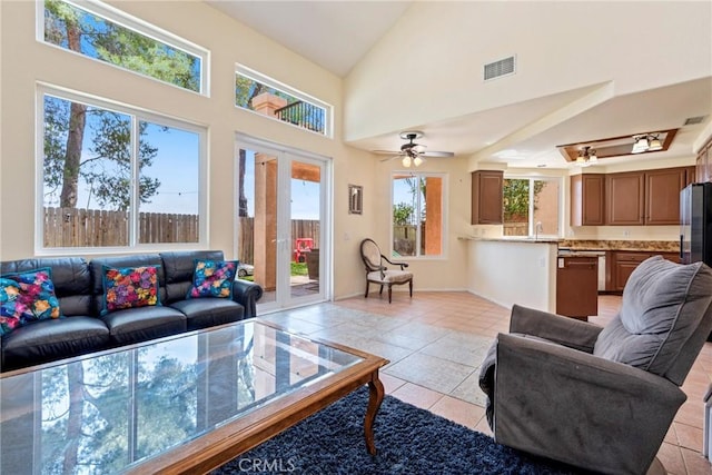 24101 Crowned Partridge Ln, Murrieta, CA 92562 - living room featuring light tile patterned floors, a ceiling fan, and high vaulted ceiling