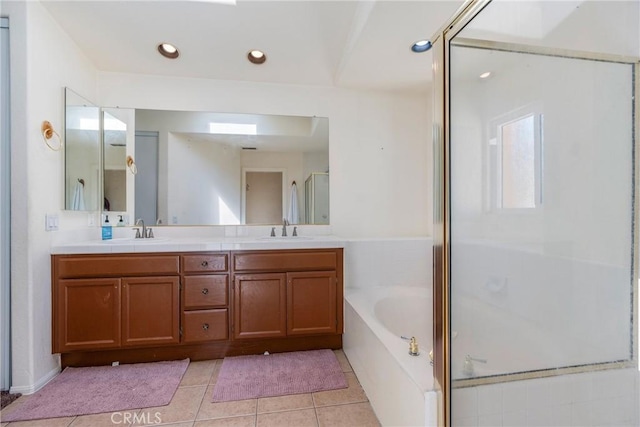 24101 Crowned Partridge Ln, Murrieta, CA 92562 - full bathroom with double vanity, a bath, tile patterned floors, an enclosed shower, and recessed lighting