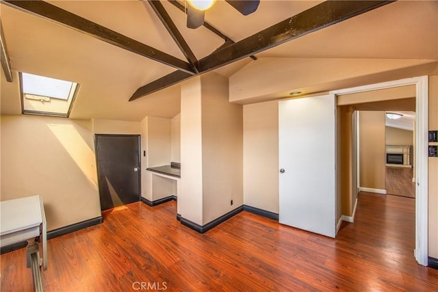 27470 Lakeview Dr, Helendale, CA 92342 - kitchen with ceiling fan, a skylight, wood finished floors, and baseboards