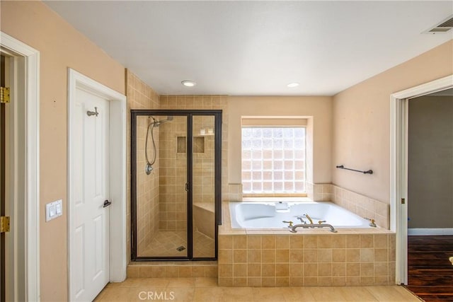 27470 Lakeview Dr, Helendale, CA 92342 - full bathroom featuring a garden tub, a stall shower, recessed lighting, and wood finished floors
