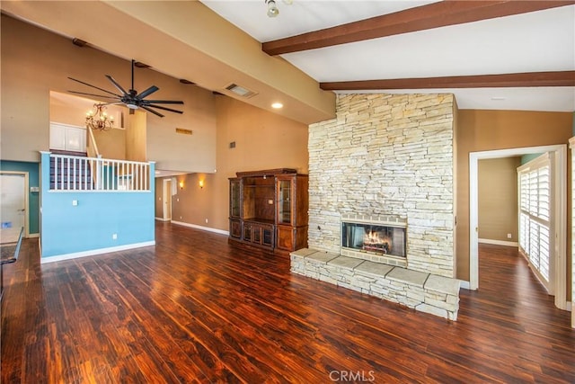 27470 Lakeview Dr, Helendale, CA 92342 - unfurnished living room featuring a stone fireplace, baseboards, wood finished floors, beamed ceiling, and ceiling fan