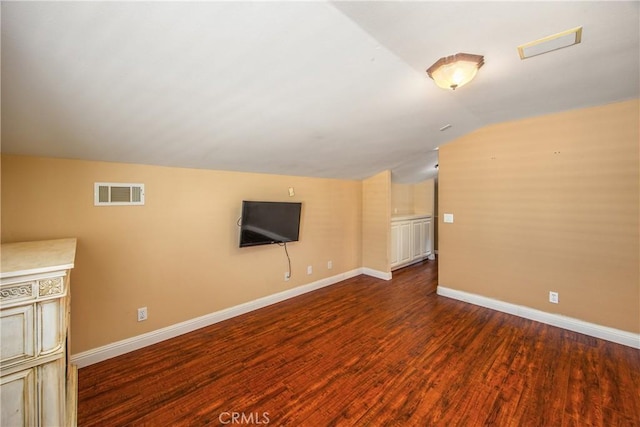 27470 Lakeview Dr, Helendale, CA 92342 - unfurnished living room featuring baseboards, wood finished floors, and vaulted ceiling
