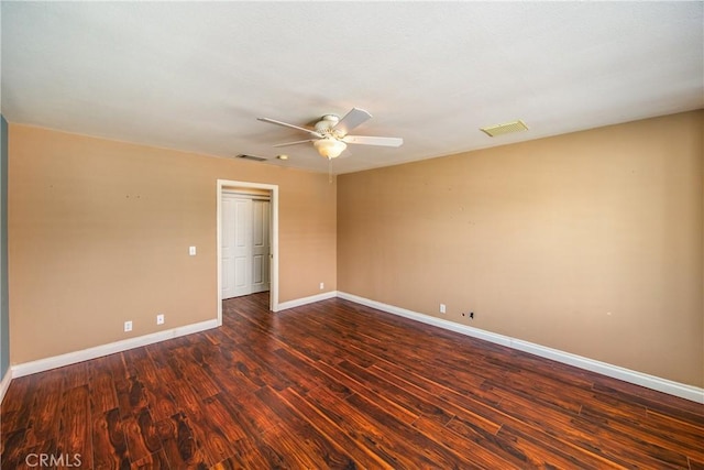27470 Lakeview Dr, Helendale, CA 92342 - empty room featuring dark wood finished floors, ceiling fan, and baseboards