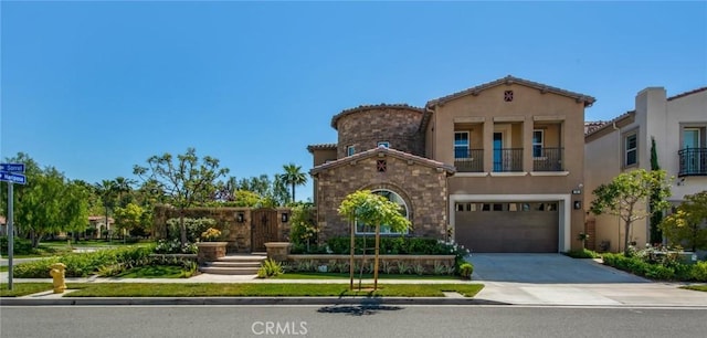 18 Sorrel, Lake Forest, CA 92630 - mediterranean / spanish-style house with stucco siding, driveway, a balcony, and a garage