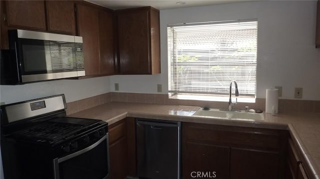 284 Celeste Dr, Riverside, CA 92507 - kitchen featuring appliances with stainless steel finishes and light countertops