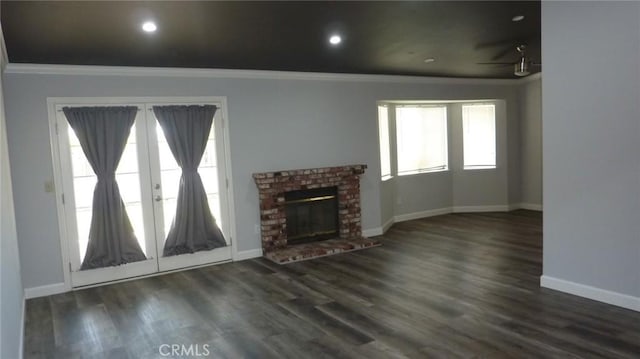 284 Celeste Dr, Riverside, CA 92507 - unfurnished living room with crown molding, wood finished floors, and a brick fireplace