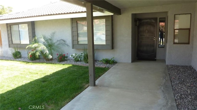 284 Celeste Dr, Riverside, CA 92507 - entrance to property with stucco siding and a lawn