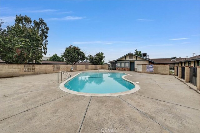 12830 Perris Blvd Unit C10, Moreno Valley, CA 92553 - community pool featuring a patio area