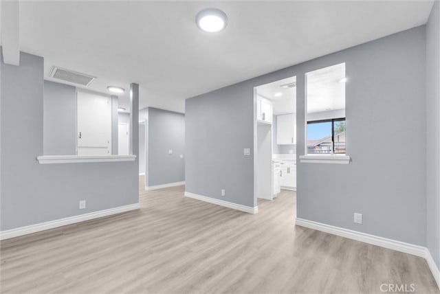 12830 Perris Blvd Unit C10, Moreno Valley, CA 92553 - spare room with light wood-type flooring and baseboards