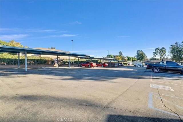 12830 Perris Blvd Unit C10, Moreno Valley, CA 92553 - view of partially covered parking lot