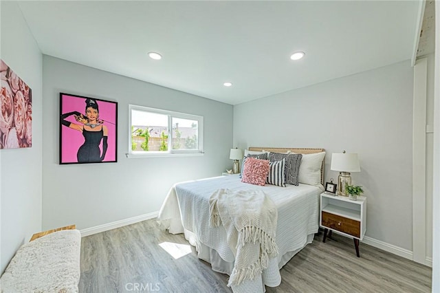 11591 Palawan St, Cypress, CA 90630 - bedroom with wood finished floors and recessed lighting