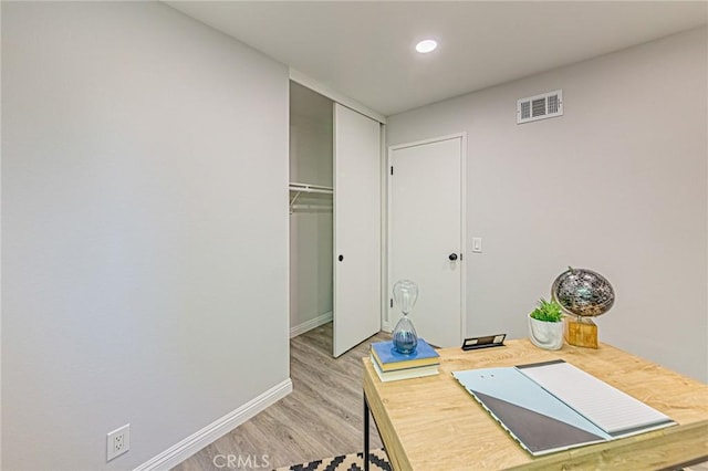 11591 Palawan St, Cypress, CA 90630 - home office featuring light wood-type flooring and recessed lighting