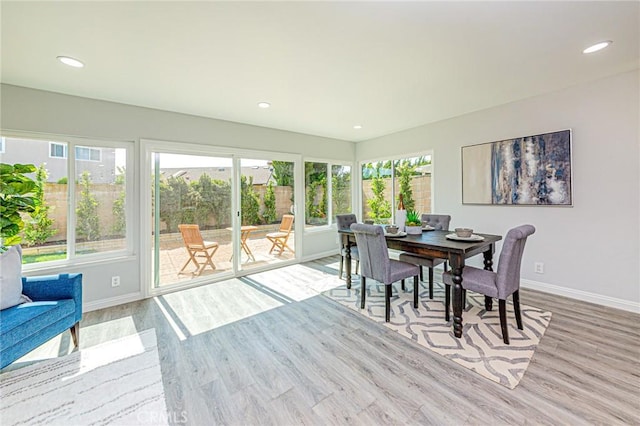11591 Palawan St, Cypress, CA 90630 - dining space with wood finished floors and recessed lighting