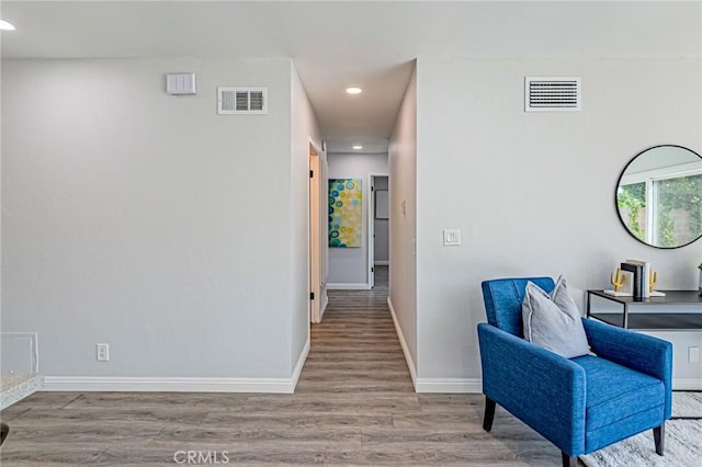 11591 Palawan St, Cypress, CA 90630 - hallway with recessed lighting and wood finished floors