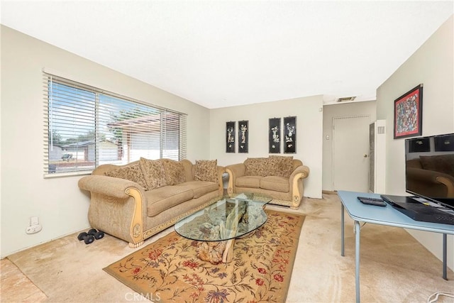 632 E Oldfield St, Lancaster, CA 93535 - carpeted living room with a heating unit