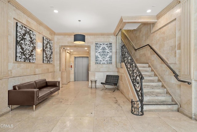 35 N Raymond Ave Unit 210, Pasadena, CA 91103 - building lobby featuring stairs, ornamental molding, and recessed lighting