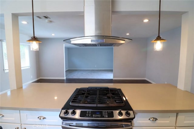 425 E Wilson Ave, Orange, CA 92867 - kitchen featuring island exhaust hood, gas stove, white cabinetry, light countertops, and recessed lighting