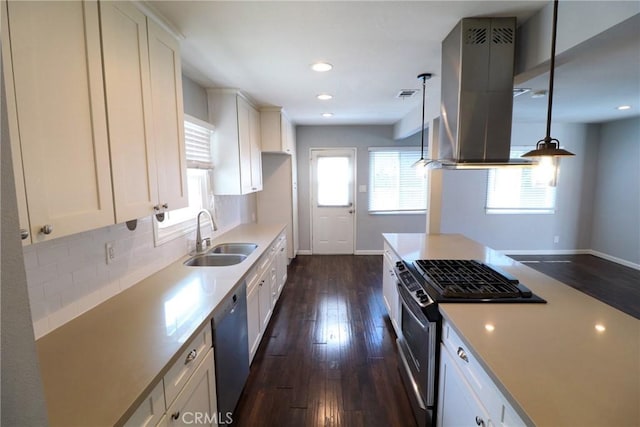 425 E Wilson Ave, Orange, CA 92867 - kitchen featuring a sink, island exhaust hood, appliances with stainless steel finishes, baseboards, and recessed lighting