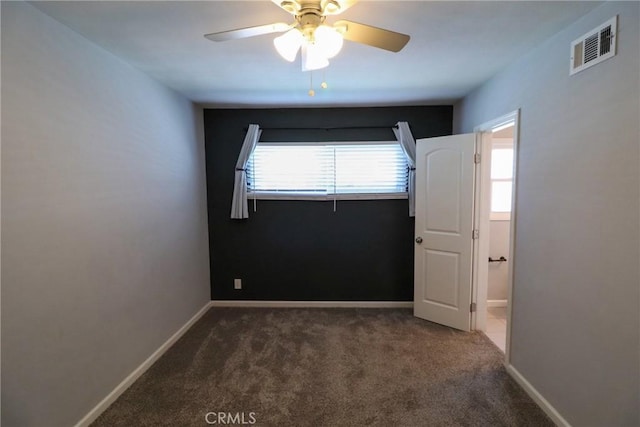 425 E Wilson Ave, Orange, CA 92867 - carpeted spare room with ceiling fan and baseboards