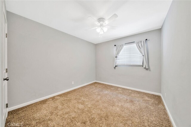 425 E Wilson Ave, Orange, CA 92867 - spare room featuring a ceiling fan and carpet flooring